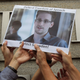 Protesters hold a photo of Edward Snowden outside the US Consulate in Hong Kong in 2013